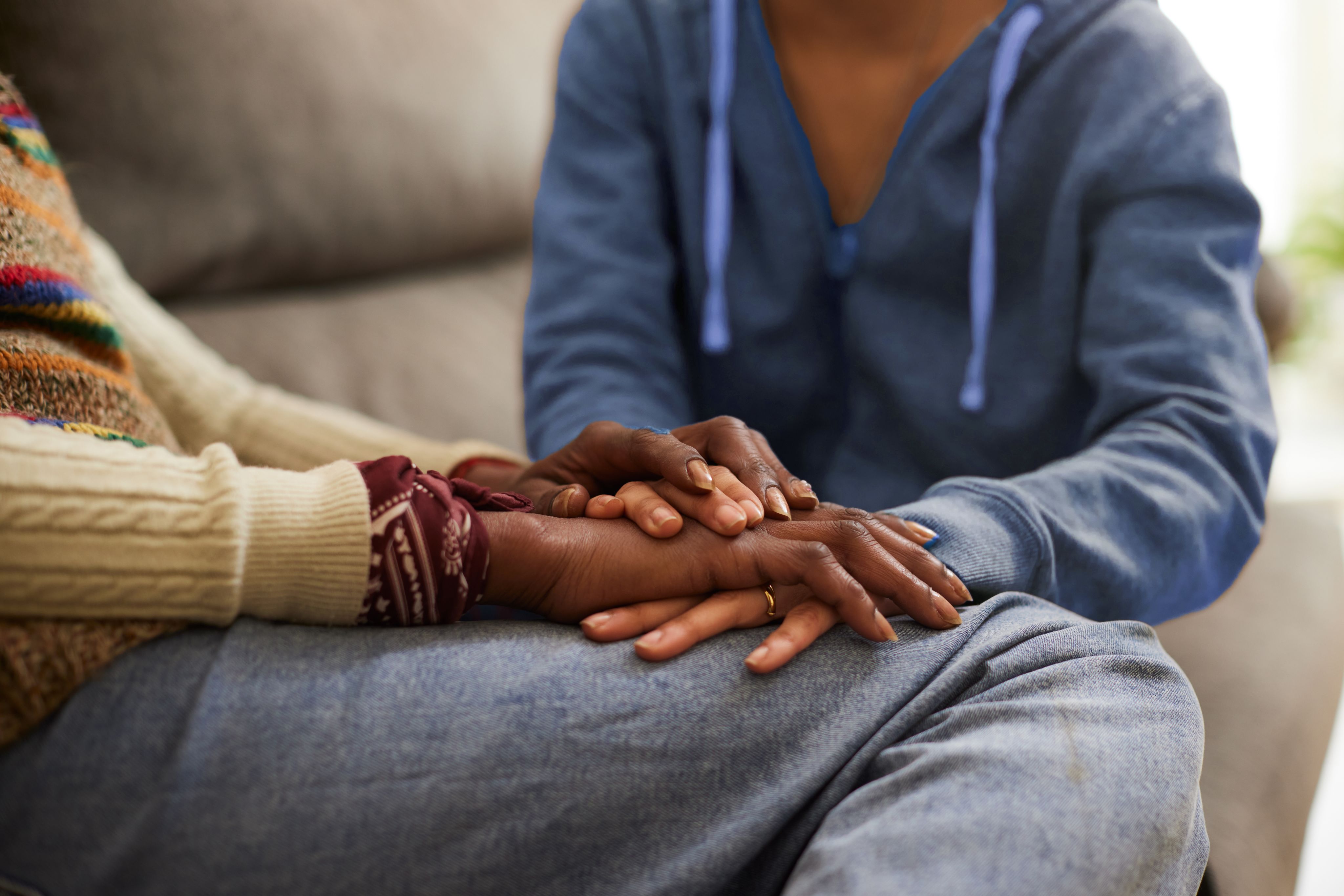 person holding black academic hat