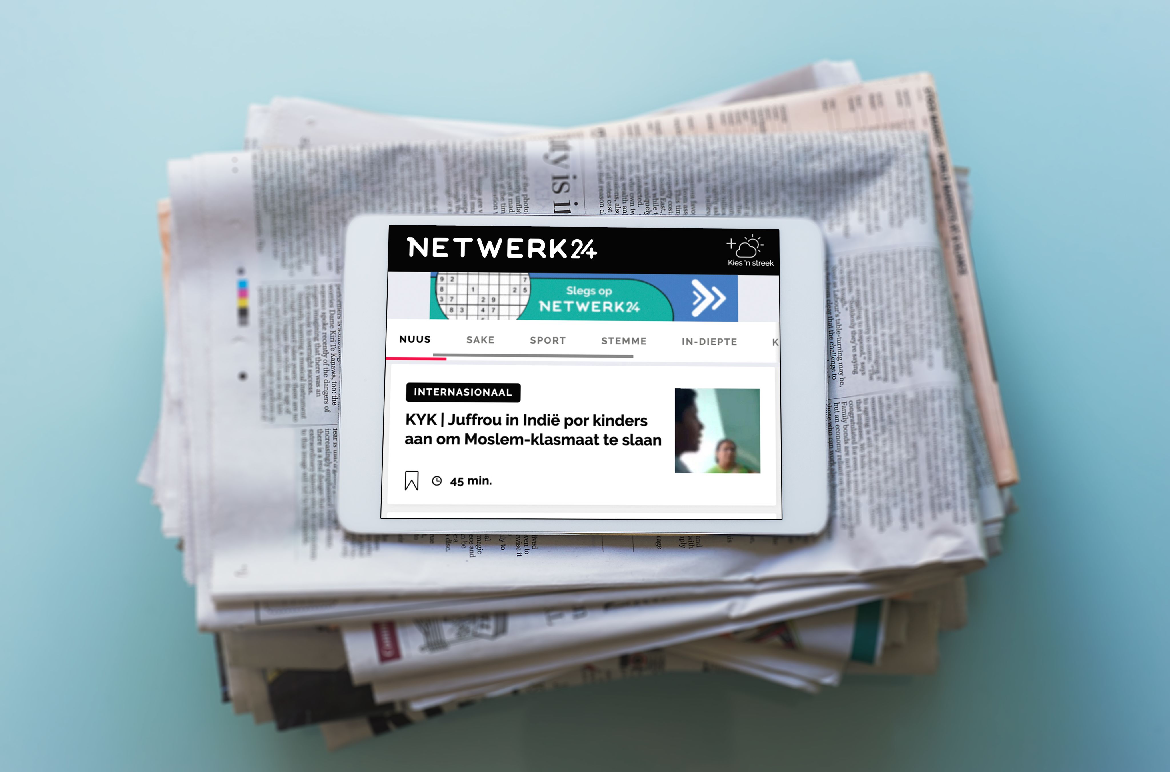 macbook pro on white textile