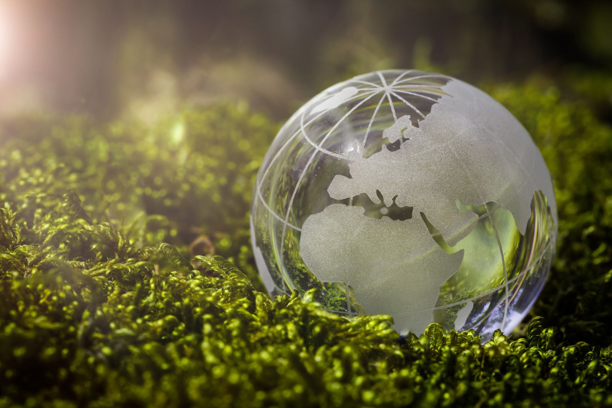 aerial photography of yellow cultivator on brown field
