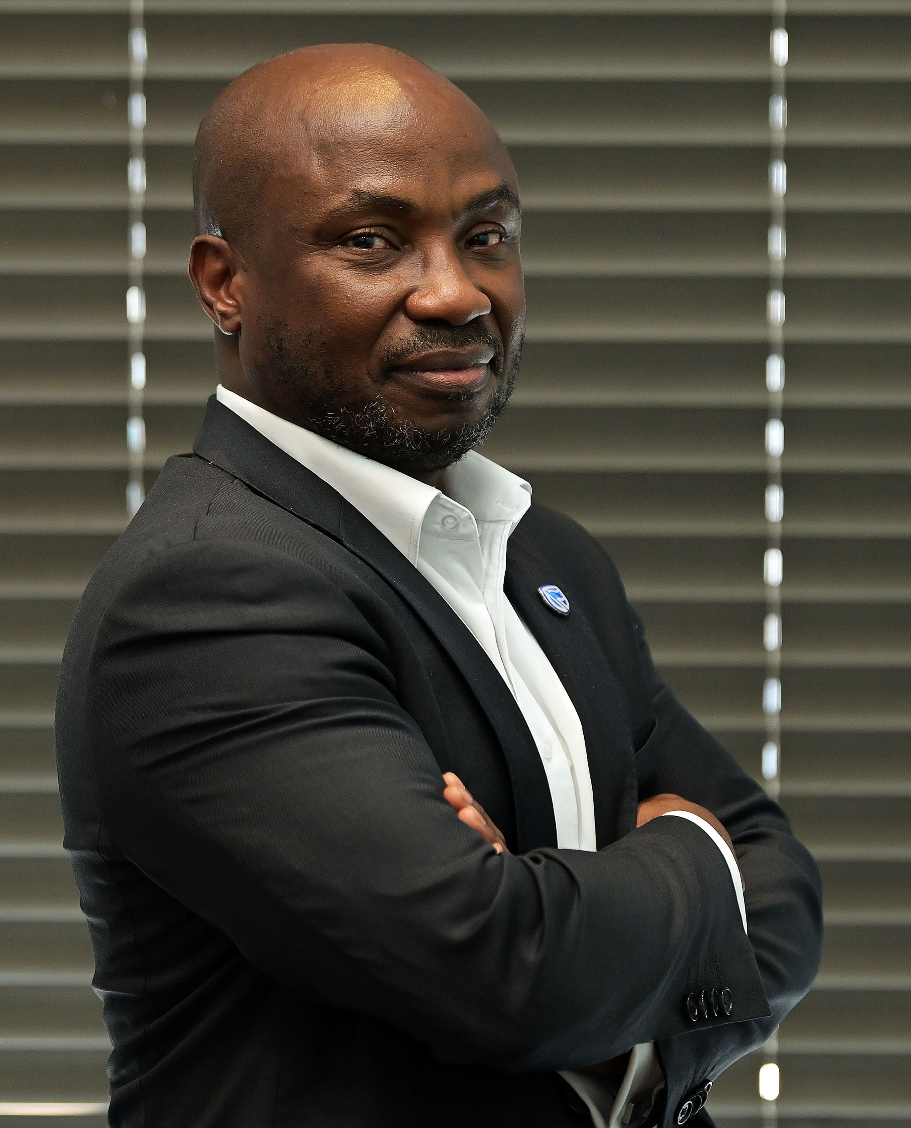 a person holding a plant in their hands